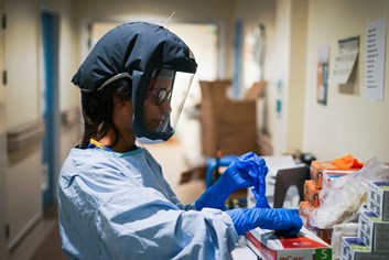 Woman wearing full PPE